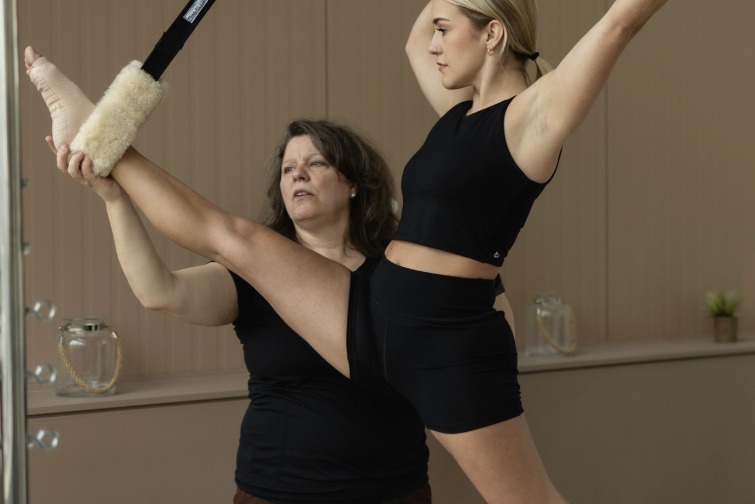 Laura Jane teaching a client at Titan Pilates