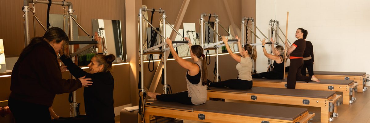 Laura Jane coaching movement at Titan Pilates